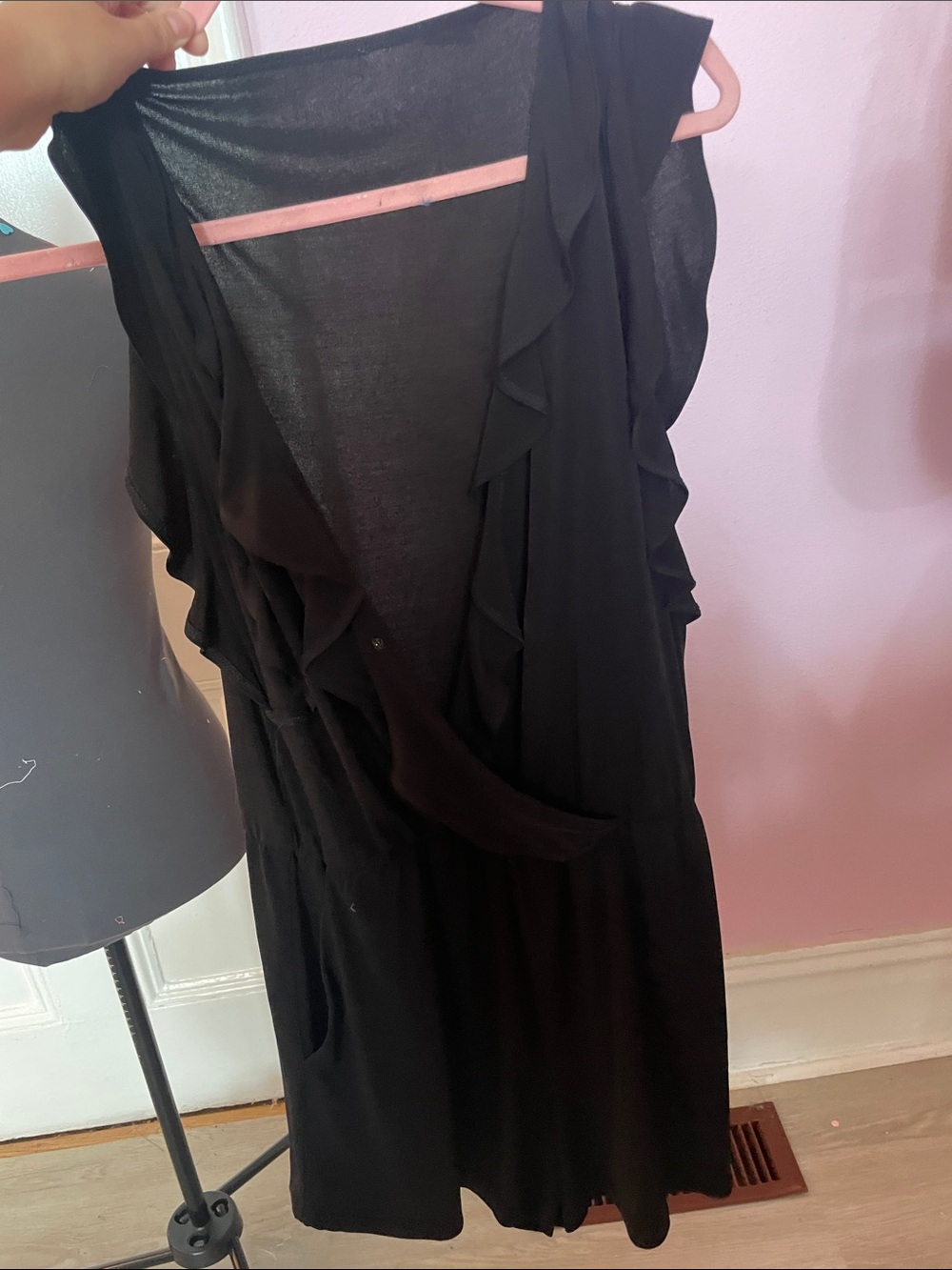 Black Romper with Ruffle Wrap top.